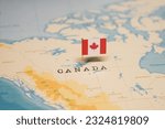 The flag of canada on the world ...