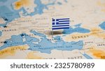 The flag of greece on the world ...