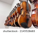 Row Of Multiple Violins With...