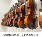 Row Of Multiple Violins With...
