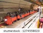 Small photo of London, UK - December 2018: Royal Mails Museum, Subterranean railway under London streets, Small narrow passage train for tourists that have replaced the original post and parcel carriages