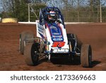 Small photo of New Egypt, NJ, USA - April 30, 2022: Race driver Al Cheney powers his Sprint Car through a turn during a race at New Egypt Speedway in New Jersey.