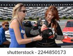 Small photo of Long Pond, PA, USA - July 29, 2017: Race driver Jennifer Jo Cobb signs autographs during a NASCAR Truck Series event at Pocono Raceway in Pennsylvania.