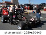 Small photo of Nazareth, PA, USA - August 23, 2003: Race driver Chet Fillip's team prepares to compete in a USAC Silver Crown race during an IndyCar weekend at Nazareth Speedway.
