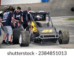 Small photo of Anderson, IN, USA - May 26, 2018: Race driver Jo Jo Helberg makes a pit stop during the Little 500 Sprint Car race at Anderson Speedway in Indiana.