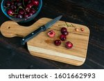 Pitting Fresh Cherries With A...