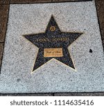 Small photo of BIRMINGHAM, UK - JULY 28, 2017: A star dedicated to Tony Iommi in the "Walk of Stars"