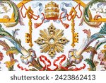 Small photo of Citta del Vaticano, Vaticano - Stato della Citta del Vaticano - 11-22-2022: Detail of a Vatican mosaic showcasing the papal tiara and crossed keys, symbols of the papacy