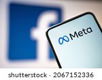 Small photo of Cracow, Poland - October 29, 2021: Mark Zuckerberg announced facebook logo change to meta and creates metaversum that integrates services. Brand change concept on smartphone and computer monitor.