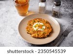 Small photo of Hash Brown egg nests in a plate. toning