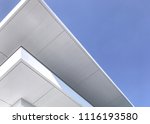 Modern white building against a blue sky