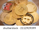 Small photo of Close up of various kinds of cryptocurrency token coins. Cryptocurrency is a digital or virtual currency that is secured by cryptography.