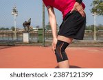Small photo of Runner woman having suffering from waist pain after doing hard workout. Muscle strain is often the cause of waist pain from heavy lifting or vigorous exercise.