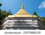 Small photo of An old Buddhist pagoda in Wat Phra Kaew temple in Chiang Rai province of Thailand. In 1434, after a lighting strike cracked open this pagoda, emerald Buddha statue was discovered in this pagoda.