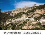 Panoramic view from coastal town Positano on mountain peaks of Monte San Michele, Molare, Canino, Caldare in Lattari Mountains, Apennines, Amalfi Coast, Italy, Europe. Parts of upper Positano village