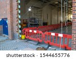 Small photo of shop refit store refit renovation construction with scaffolding tower store refit
