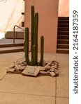Small photo of Superior, AZ, USA - May 2022: cactus Commemorative memorial statue to honor and remember the USMC Boyce Thompson Arboretum