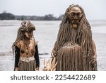 Small photo of A Malaysian indigenous Mah Meri tribesman wears a traditionally crafted mask during the "Puja Pantai" ritual, in Carey Island on the outskirts of Kuala Lumpur on January 26, 2023