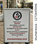 Small photo of WASHINGTON, DC - JANUARY 1, 2019: DC GOVERNMENT supports statehood. Sign at GOVERNMENT OF THE DISTRICT OF COLUMBIA headquarters office building provides information supporting DC statehood.
