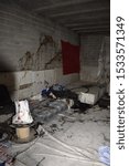 Small photo of Ransacked Refugees Shanty Living Room