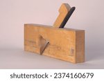 Small photo of Cologne, Germany - 2023-10-11: Studio photography of a Side rabbet plane in front of a neutral background. The plane is showing wear and tear.
