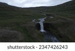Small photo of AERIAL VIEW The Gufufoss waterfall is the largest in Seydisfjordur fjord, located in the beautiful East Fjords of East Iceland. Gufufoss is the largest of the many waterfalls upslope of Seydisfjordur.
