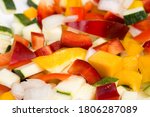 Small photo of chopped colorful vegetables on plete closeup selective focus