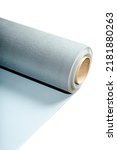 Small photo of Laminate underlay with adhesive surface. Protective layer for wood flooring.