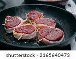 Small photo of Raw beef meat for cooking steak. Raw beef is sliced, cooking meat for cooking steak in a cooking class. Steak minion. Home made.