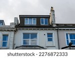 Small photo of Victorian terraced townhouse topped with a dormer window loft conversion