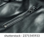 Black leather jacket close-up selective