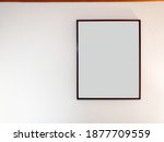 a blank wooden picture frame... | Shutterstock . vector #1877709559