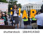 Small photo of Washington, DC â€“ July 17, 2018: President-elect Joe Bidenâ€™s possible nominee to head the Office of Management and Budget, Neera Tanden, speaking during a Kremlin Annex rally at the White House.