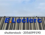 Small photo of Bois-d'Arcy, France - October 7, 2021: Sign and logo on the facade of an E. Leclerc shopping center and hypermarket