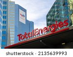 Small photo of Courbevoie, France, March 14, 2022: Exterior view of the tower housing the headquarters of the oil company TotalEnergies, formerly known as Total, in the business district of Paris La Defense