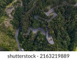 Small photo of The road with 400 bends in the Cirque de Cilaos with aerial view by drone, Reunion Island