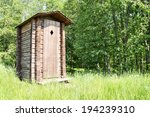 Old wooden outhouse for tourists at a forest 