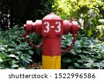 Red And Yellow Hydrant With...