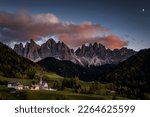 Peaks of the Odle group with village St. Magdalena in autumn in the evening light, Villnößtal, St. Magdalena, South Tyrol, Italy