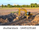 Large Tracked Excavator Digs...