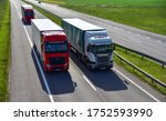 Small photo of BELARUS - JUN 07, 2020: Semi-trailer Trucks Mercedes-Benz Actros and SCANIA driving on highway. Truck on asphalt road overtakes another truck. Goods Delivery. Services and Transport logistics