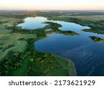 Small photo of Freshwater Lakes. Water supply problems and water deficit, ecology and environmental. Surface and groundwater pollution. Global drought crisis. Drink water safe. Forest lake, Wetland green background.
