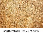 Hay background. Haystacks background, texture. Wheat gold hay in field. Hay prepared for farm animal feed in winter. Stacks dry hay open air fiel. Straw bale harvesting. Haybale background