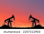 Small photo of Crude oil Pumpjack on sunset. Fossil crude output and fuels oil production. Oil drill rig and drilling derrick. Global crude oil Prices, energy, petroleum demand (OPEC+). Pump jack at oilfield.