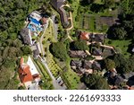 Small photo of Banos, Ecuador, 1-10-2023: Aerial top view of the hotel Luna Volc?n