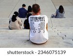 Small photo of CHICAGO, IL -2 JUNE 2023- View of Swiftie fans dressed up to attend the Taylor Swift Eras Tour concert outside Soldier Field in Chicago, Illinois in June 2023.