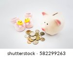 Piggy Bank With Coin And Socks...