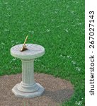 Small photo of Sundial / Sun Clock with Gnomon on Grass Plot. Antique Style. Marble and Bronze. CG image
