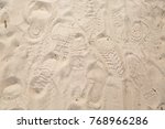 Shoes Print On Sand