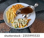 Small photo of Crispy Dory Steak With Dory Fillet Fish Meat, French Fries And Mix Vegetables With Mayonnaise. Food Menu